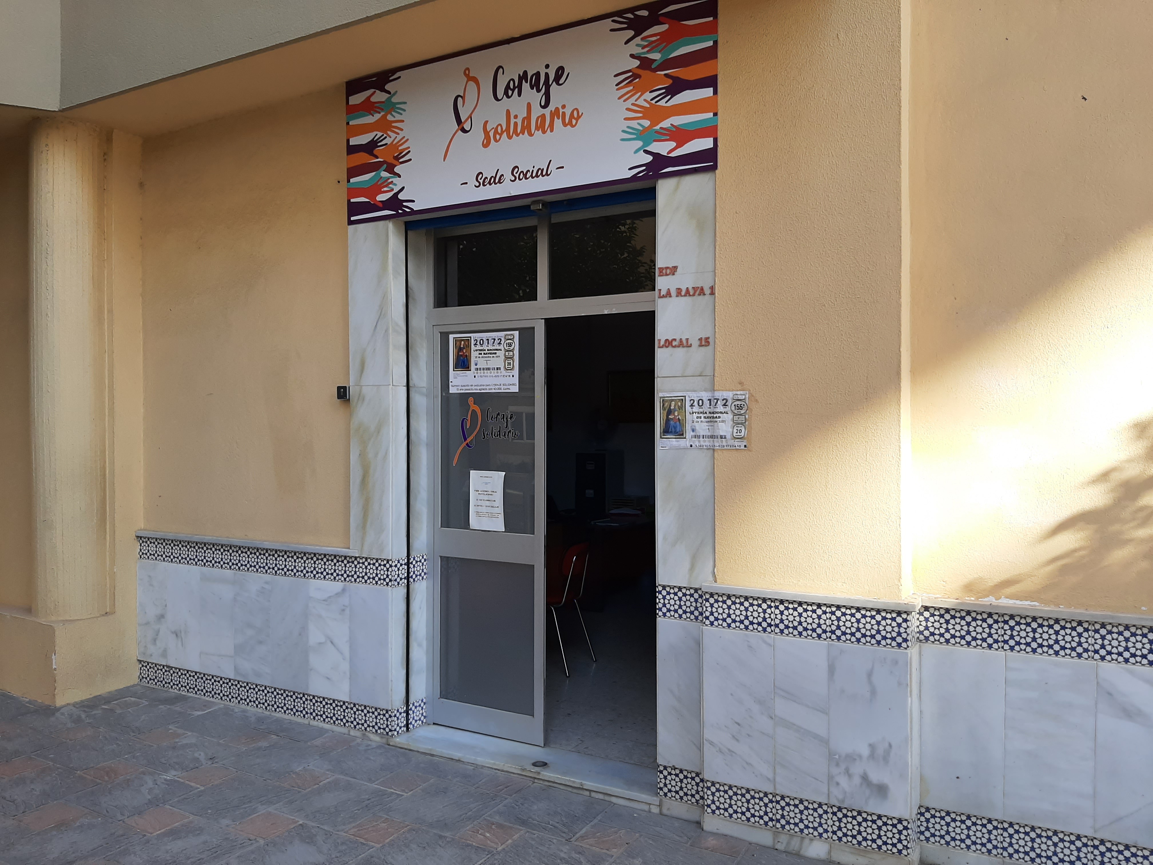 A render of three white cylindrical columns, against a warm creme background